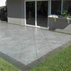 Concrete patio stamped from a fresh concrete pour.